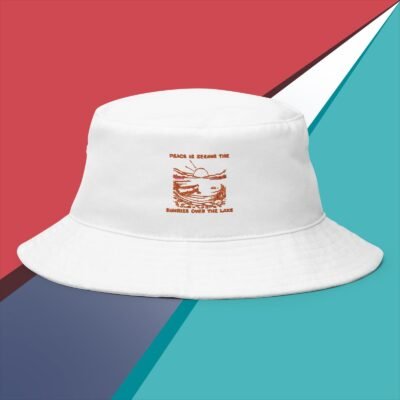 Peace is seeing the sunrise over the lake Bucket Hat